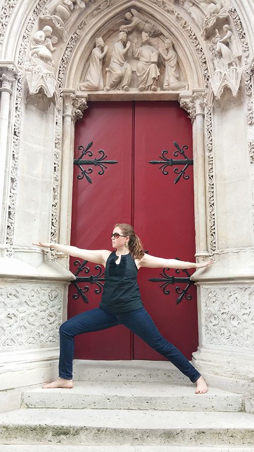 Warrior Two in front of beautiful red door of Notre Dame. It was on a busy street with many people passing by, we were the only ones who stopped to appreciated the bold door!